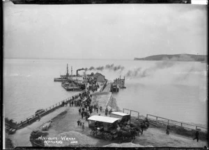 Northcote wharf, Auckland, showing passengers and two covered carriages