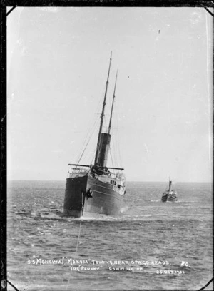 The steamship 'Monowai' being towed near Otago Heads