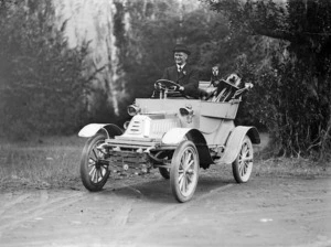 Sergeant Dougan at the wheel of a car