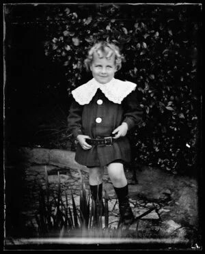 Small boy in garden