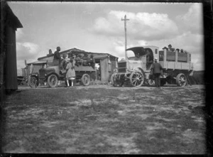 Two vehicles transporting passengers across McCarroll's Gap on the Whangarei to Auckland railway line, 1923