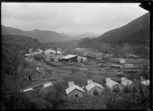 Unidentified timber milling settlement situated in a valley