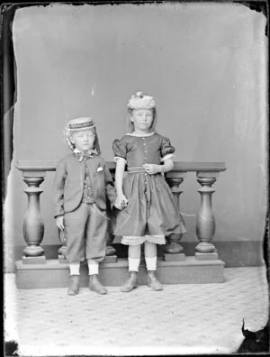Unidentified boy and girl, the boy with a boater marked Galatea