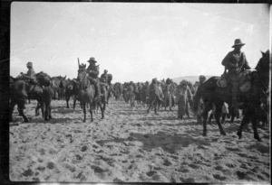 Soldiers of the ANZAC Mounted Division with Turkish Prisoners
