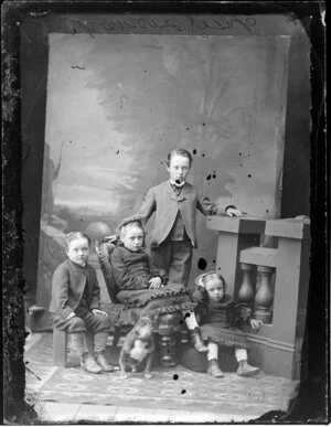 Four unidentified child and dog