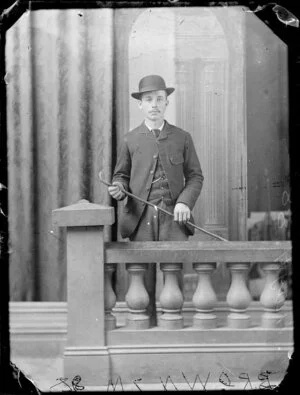 Mr Brown, with hat and cane