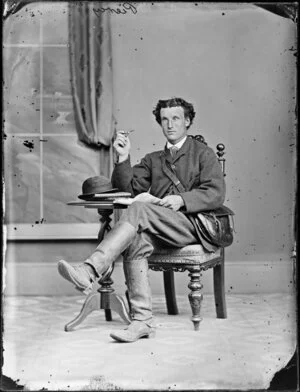 Mr Piercy, seated, with his pipe