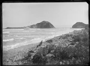 Tuamoto Island, viewed from Kaiti, Gisborne, featuring rocky coastline of Kaiti