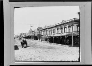 Victoria Avenue, near the bridge, with Joseph Paul Drapery & Clothing shop in the foreground, Whanganui
