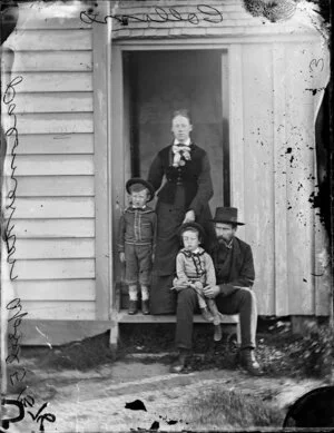 Mr Collins, schoolmaster, Palmerston North, with his wife and two children