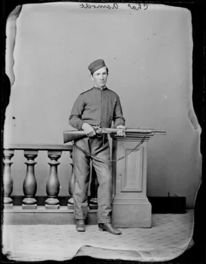 Captain Charles Aamodt, with rifle