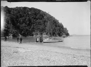 Men boarding a yacht, Cowes Bay, Waiheke Island
