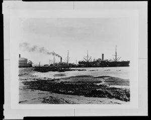 Beach and wharf with ships berthed, Bluff, Southland