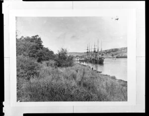 Sailing ship berthed at the side of an unidentified river, [Australia?]
