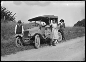 Four people with a car, motoring near Whangarei, 1923