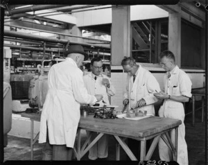 Testing and tasting of canned goods, Westfield Freezing Works, Otahuhu, Auckland - Photograph taken by W Walker