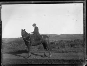 Unidentified man on a horse