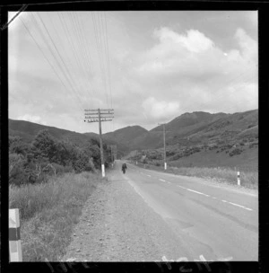 Alfred Hamish Reed on the road just north of Kaitoke, during his walk from North Cape to Bluff