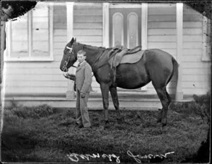 Bernard Lower, [age 11], with a horse