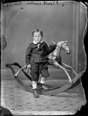 J Southcombe, his son aged 4, by rocking horse