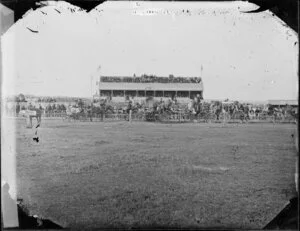Race meeting at Whanganui with stand and carriages