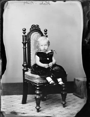 Hales toddler, sitting on a chair