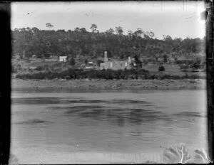 Two small buildings in a rural area by the side of an unidentified river [Australia?]