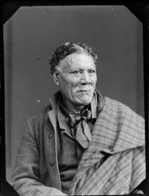 Unidentified Maori man with facial tattoo on nose and chin