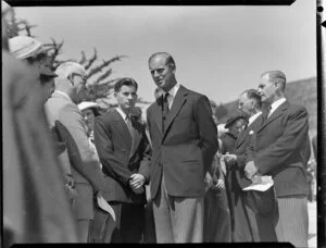 The Duke of Edinburgh talking to people attending the mass burial of Tangiwai railway disaster victims, Karori Cemetery, Wellington, Royal Tour 1953-1954