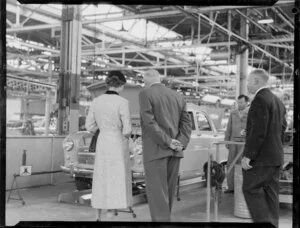 Queen Elizabeth II inspecting a car in the Ford Motor Company factory, Lower Hutt, Royal Tour 1953-1954