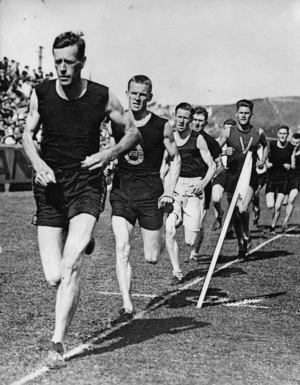 Randolph Rose leading the field in a long distance track race