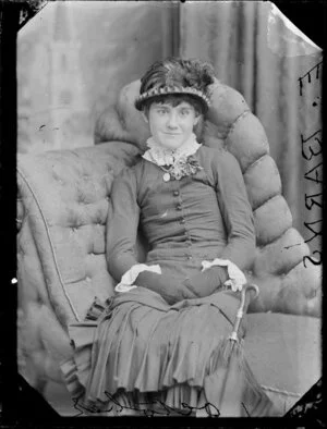 Ethel Elizabeth Barns posing on Victorian chaise longue