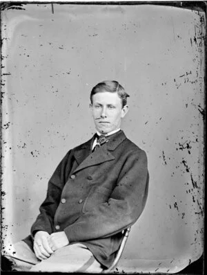 Unidentified young man in a double-breasted jacket