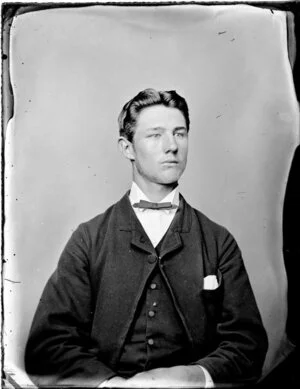 Unidentified young man with a chinstrap beard