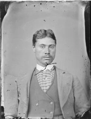 Unidentified young Maori man with a tartan cravat