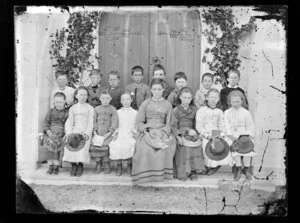 Hastings School with mistress and pupils