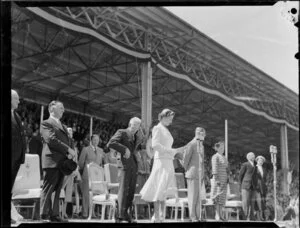 Queen Elizabeth II reading her speech at the children's gathering at Athletic Park, Wellington, Royal Tour 1953-1954