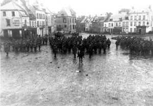 New Zealand soldiers assembled in Le Quesnoy market square after the town's recapture in World War I