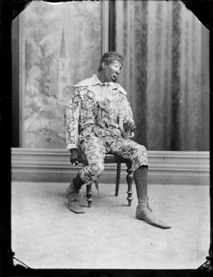 Unidentified man, dressed in theatrical, vaudeville clown costume