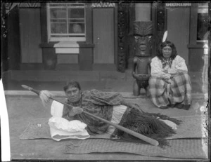 Two Maori women outside Huriwhenua meeting house at Ranana