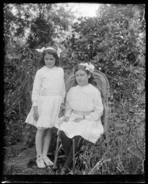 Two young girls in a garden