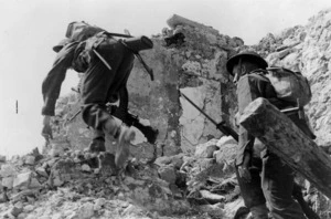Two soldiers, on the battlefront at Cassino, Italy, during manoeuvres