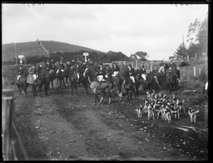 Hunt club meet, showing group on horseback and beagles