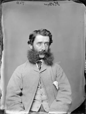 Mr Hollyer with luxuriant whiskers worn in the 'friendly mutton chops' style - Photograph taken by Thompson & Daley of Wanganui