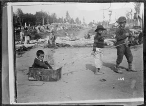 Three unidentified Maori boys playing