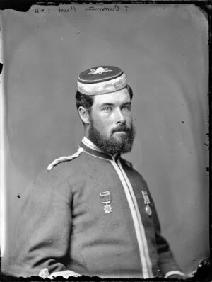 Mr T Cummins, in uniform with medals