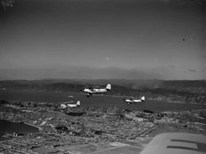 Three Blackburn Baffin biplanes flying over Miramar, Wellington