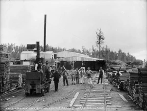Workers at a timber mill