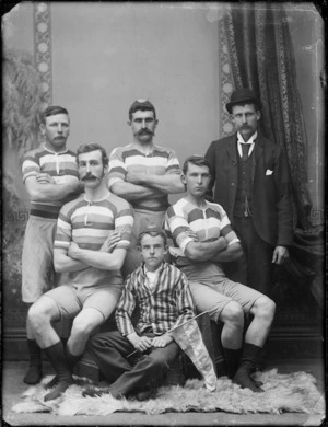 Unidentified members of a Queens Drive Boat Club rowing four, with the cox holding a flag inscribed "Geraldine".