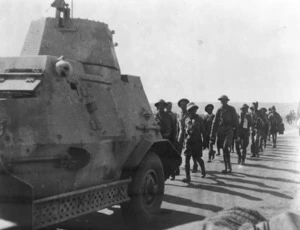 Probably shows South African soldiers being marched back after the taking of Tobruk during World War II